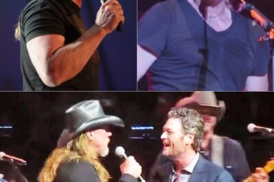 Blake Shelton Kicks Off ‘Hillbilly Bone’ Solo At The Opry, But Just As The Crowd Gets Fired Up, A Deep, Thunderous Voice Joins In—And Out Walks Trace Adkins, Sending Fans Into A Frenzy. The cheers are deafening, but then Adkins pauses, grins, and says, “Hold On, Y’all—I Ain’t The Only One.” Suddenly, the lights dim, the band holds a dramatic pause, and from the other side of the stage, Garth Brooks Struts Out, Guitar In Hand! What began as a solo performance erupted into a star-studded surprise that shook the Opry to its core!