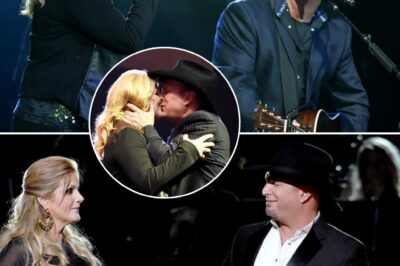 Garth Brooks and Trisha Yearwood took the stage in Charlotte, NC, and the air seemed to crackle with anticipation. As the first notes of “Shallow” echoed through the arena, their voices intertwined in perfect harmony, each note carrying an intensity that left the audience breathless. Their chemistry was undeniable—every glance, every gesture, spoke volumes, creating a magic that only they could conjure. In that moment, the iconic song from A Star Is Born wasn’t just being performed; it was being lived, breathed, and transformed into something unforgettable. The crowd was spellbound, caught in the raw power of a performance that would linger long after the final note.