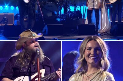 Chris Stapleton and Wife Morgane Light Up the CMA Stage with a Spellbinding Performance, Her Silver Gown Shining Like a Star While His Cowboy Hat Brings Timeless Country Vibes