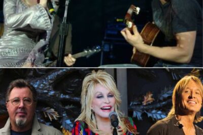 Dolly Parton and Keith Urban have just released an emotional duet, expressing eternal love that transcends time. With a sweet voice, Parton opens with lyrics full of images: “You ask how much I need you, must I explain? / I need you, oh, my darling, like roses need rain.” The lyrics are gentle like an oath, comparing love to eternal things in nature. Keith Urban harmonizes, bringing modern romance to country music, making the song more profound. The combination of these two legends has created a memorable performance, touching the hearts of listeners.