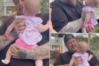 Jelly Roll shared a touching moment with his tiniest fan, baby Wrenley, during a recent event, melting hearts everywhere. The country-rap star’s encounter showcased his genuine warmth as he interacted with the adorable toddler, whose wide-eyed wonder stole the spotlight. Fans couldn’t get enough of the sweet exchange, proving that Jelly Roll’s connection with his audience knows no bounds, no matter their age.