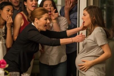 On our second wedding anniversary, I stood smiling beneath the lights and whispered, ‘I’m pregnant.’ The room froze—then my mother-in-law sneered, ‘You’re just desperate for attention!’ Before I could speak, she shoved me hard against the balcony rail. I remember screams, darkness… then a doctor’s grave voice in the hospital: ‘There’s something you need to know about this baby.’ And in that moment, my world truly began to shatter…